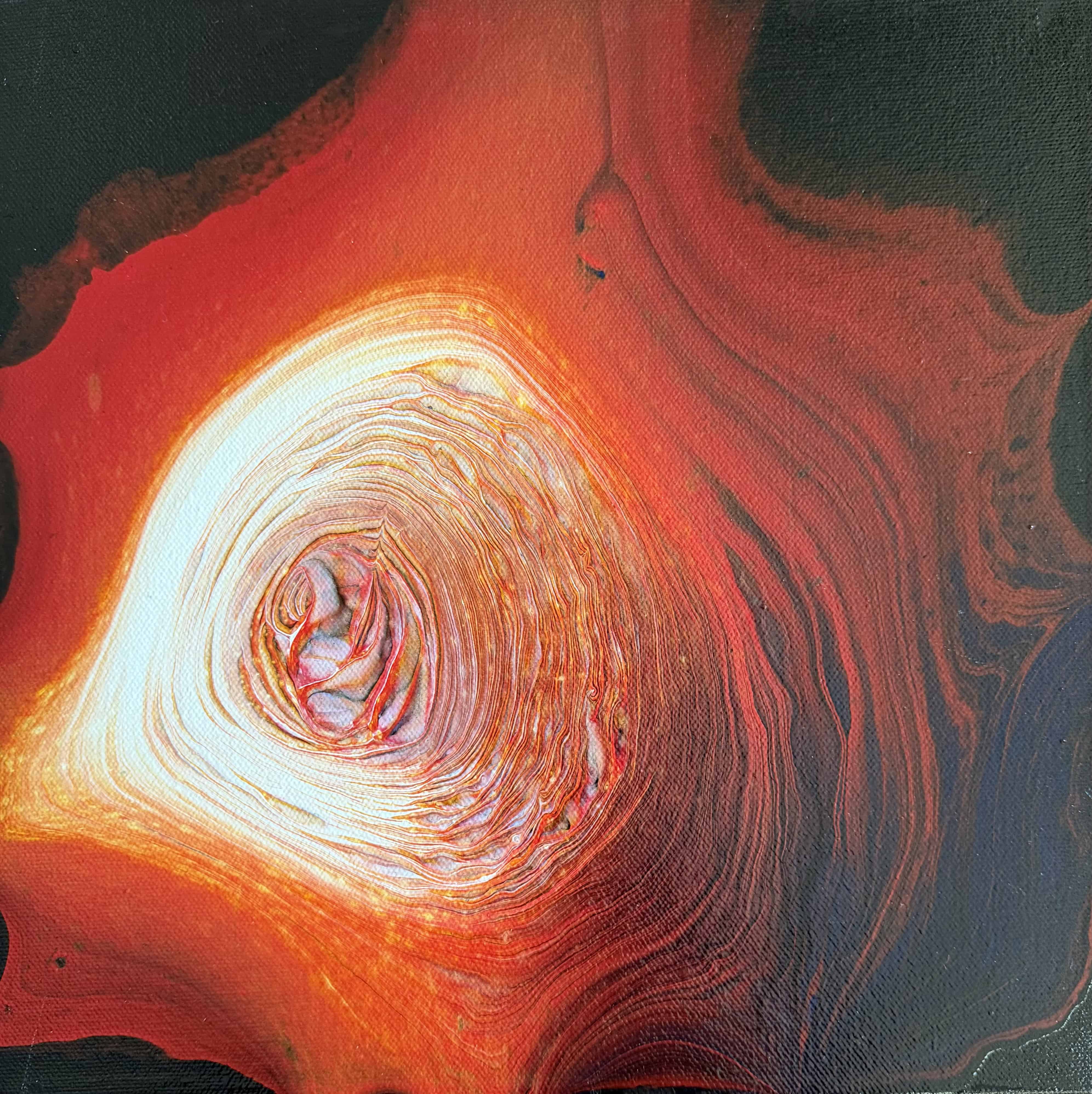 Molten Core — glowing orange and red swirl on dark background
