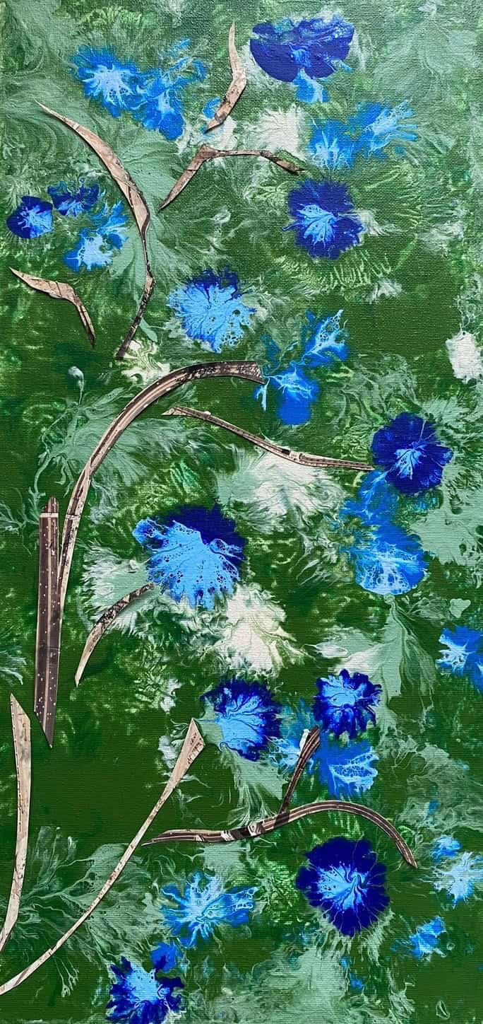 Cornflower Field — blue cornflowers scattered across a green field